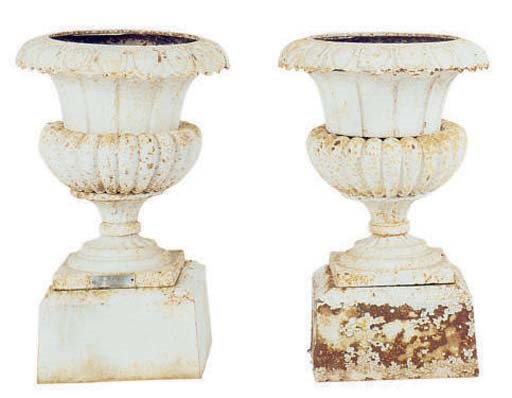 TWO PAIRS OF WHITE PAINTED CAST IRON GARDEN URNS,