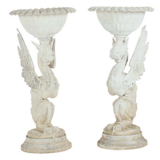 A PAIR OF CAST METAL GRIFFIN-FORM JARDINIERES,