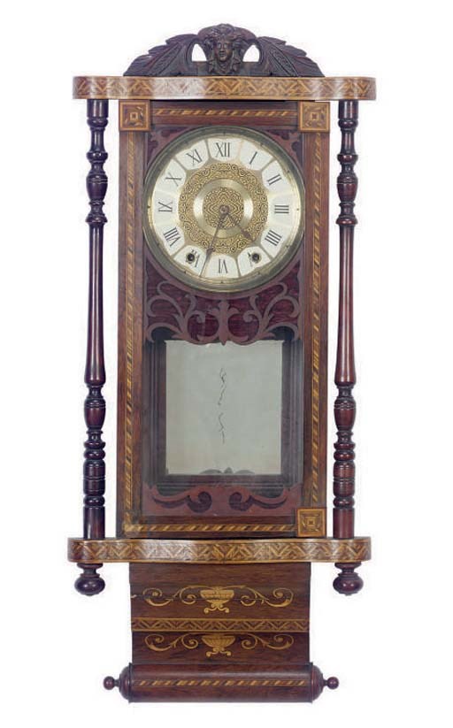 A FRENCH MARQUETRY INLAID WALNUT CLOCK,