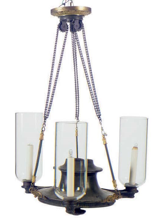 A LOUIS PHILLIPE GILT AND PATINATED BRONZE THREE LIGHT CHANDELIER,