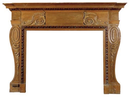 A CARVED WOOD FIREPLACE SURROUND,