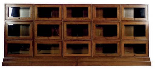 A LARGE OAK AND GLASS BOOKCASE,