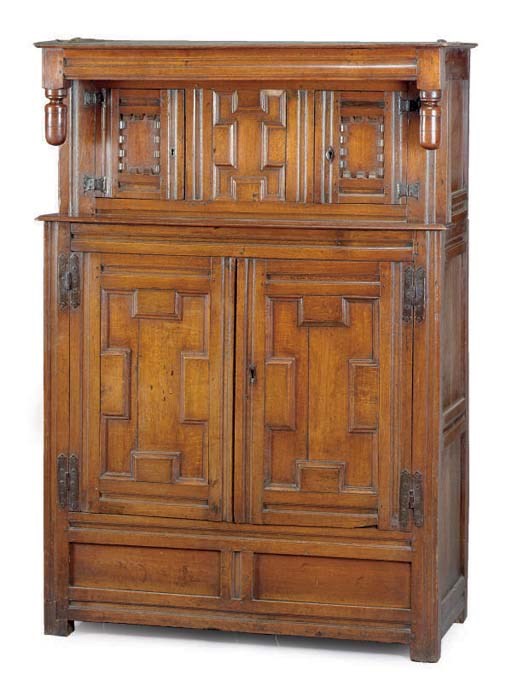AN ENGLISH OAK PRESS CUPBOARD,