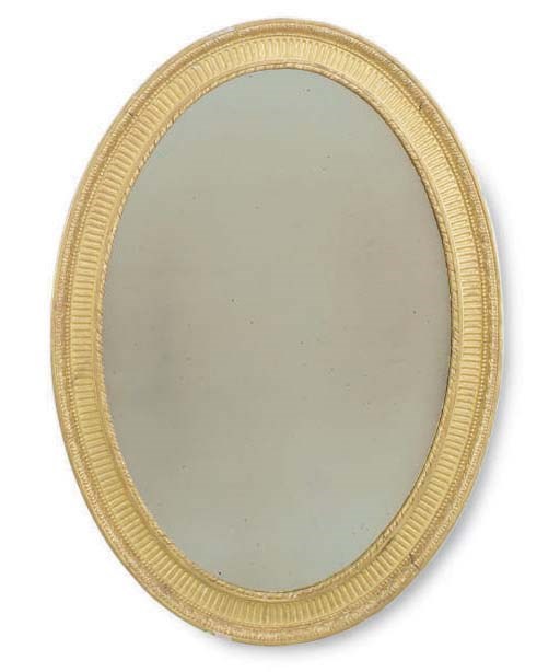 AN ENGLISH GILTWOOD OVAL MIRROR,