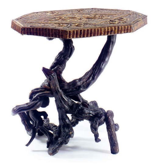 A RUSTIC TWIG AND ROOT TABLE,