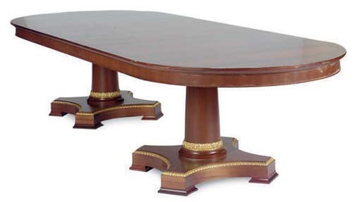 A GILT-METAL MOUNTED MAHOGANY TWIN PEDESTAL EXTENSION DINING TABLE,