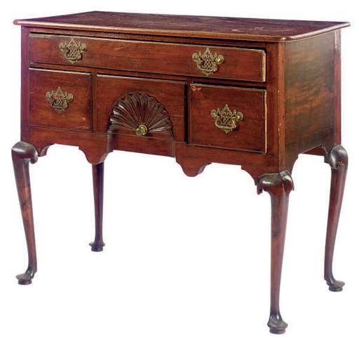 AN AMERICAN MAHOGANY BASE OF A HIGH CHEST,