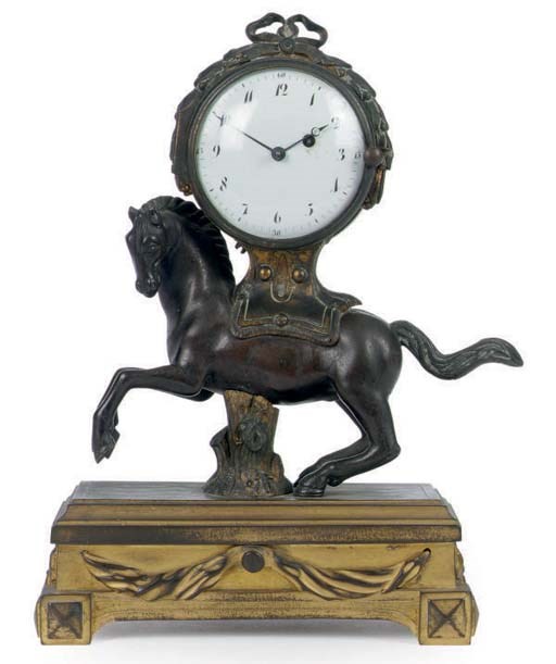 A FRENCH GILT-METAL AND PATINATED BRONZE MANTEL CLOCK,