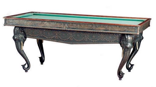 A BRASS-MOUNTED AND CAST-IRON BILLIARDS TABLE WITH LEGS CAST AS ELEPHANT HEADS