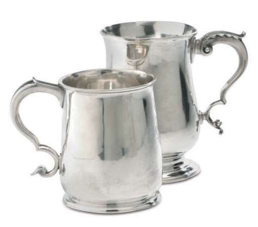 A GEORGE I SILVER MUG AND A GEORGE IV SILVER MUG,