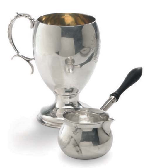 A GEORGE I SILVER BRANDY WARMER AND A GEORGE III SILVER MUG,