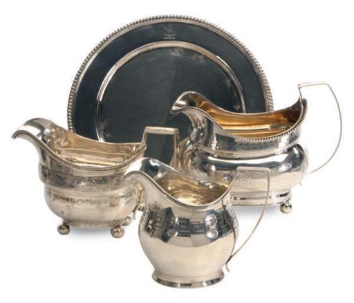 A GEORGIAN SIDE PLATE AND TWO MILK JUGS,