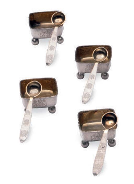 AN AMERICAN SET OF FOUR SILVER SALT CELLARS AND SPOONS,