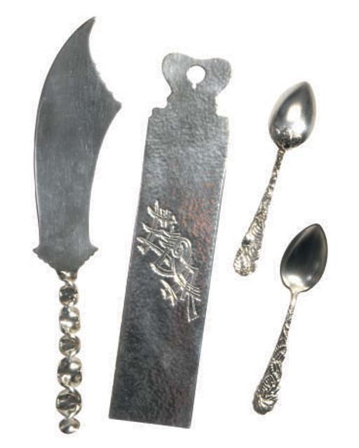 A SET OF ELEVEN AMERICAN SILVER ICE CREAM SPOONS,