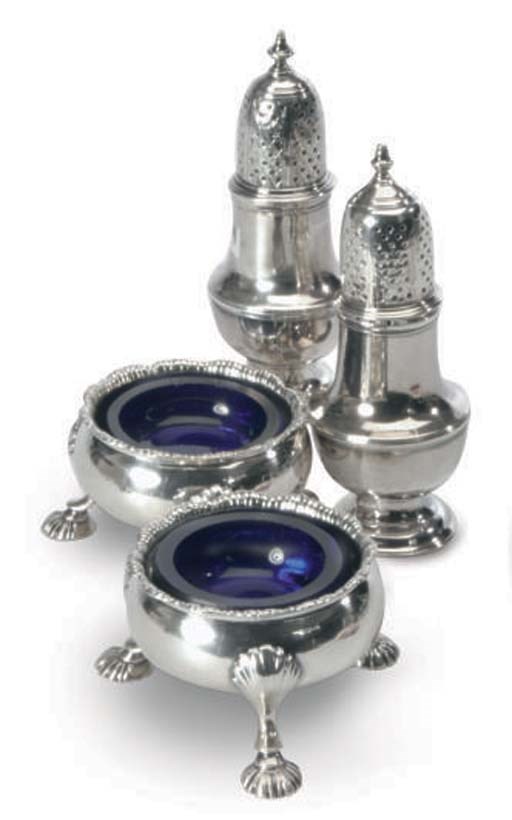 TWO ENGLISH SILVER CASTERS AND A PAIR OF SALT CELLARS,