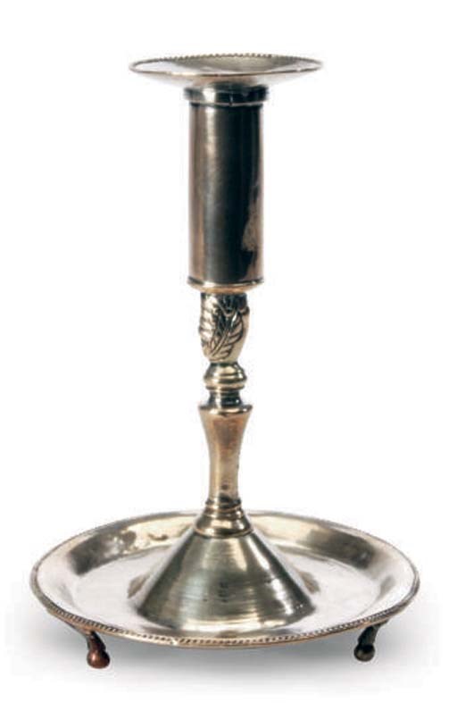 A SPANISH COLONIAL CANDLESTICK,