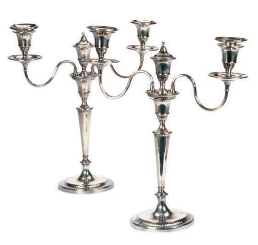 A PAIR OF ENGLISH SILVER-PLATED TWO LIGHT CANDLEABRA,