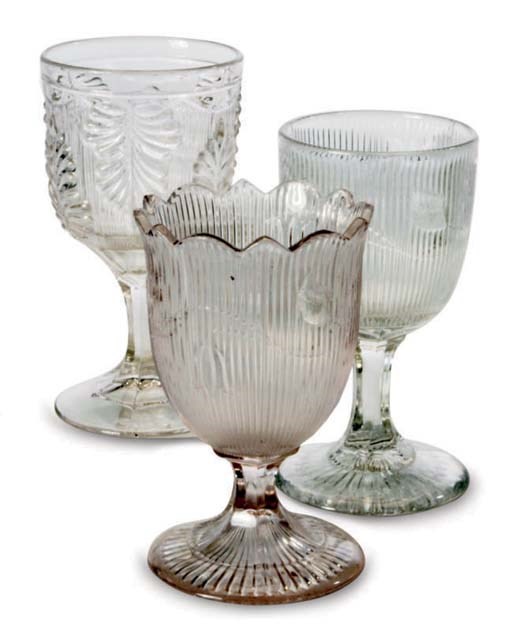 A GROUP OF SEVENTEEN AMERICAN MOLDED GLASS GOBLETS AND A SPOON HOLDER,