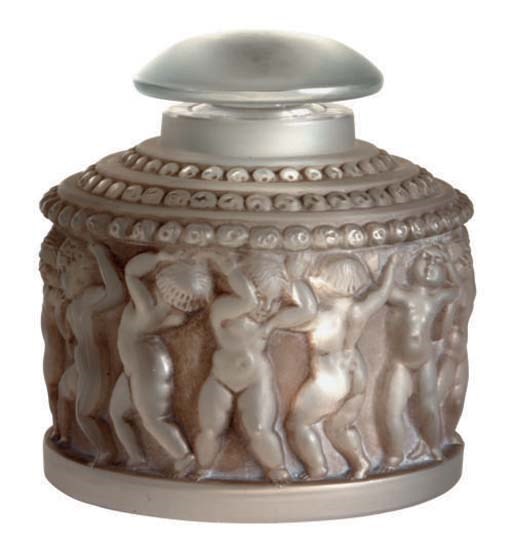 A FRENCH MOLDED GLASS SCENT BOTTLE AND STOPPER,