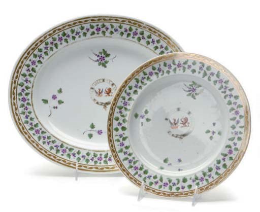 AN ENGLISH IRONSTONE CRESTED PART DINNER SERVICE,