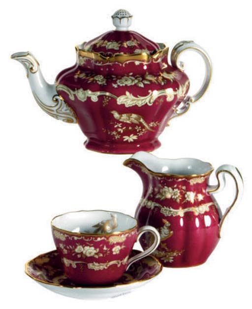 AN ENGLISH BONE CHINA POWDERED FUSCHIA-GROUND PART TEA SERVICE,
