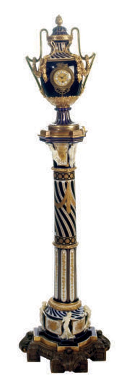 A SÈVRES-STYLE ORMOLU-MOUNTED COBALT-BLUE GROUND CLOCK AND PEDESTAL,