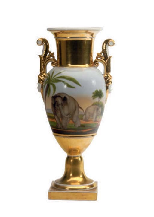 A FRENCH PORCELAIN TWO-HANDLED VASE PAINTED WITH AFRICAN LANDSCAPE SCENES,