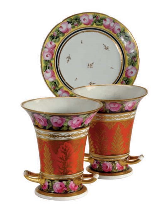 TWO FRENCH PORCELAIN TRUMPET FORM VASES AND STANDS AND THREE  DESSERT PLATES,
