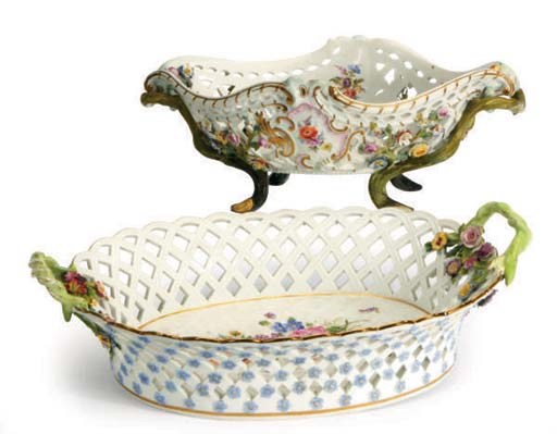 TWO GERMAN RETICULATED BASKETS WITH BRANCH HANDLES,