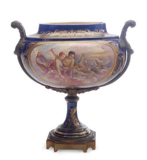 A SÈVRES STYLE ORMOLU-MOUNTED PORCELAIN BLUE GROUND OVOID-SHAPED CENTER PIECE,