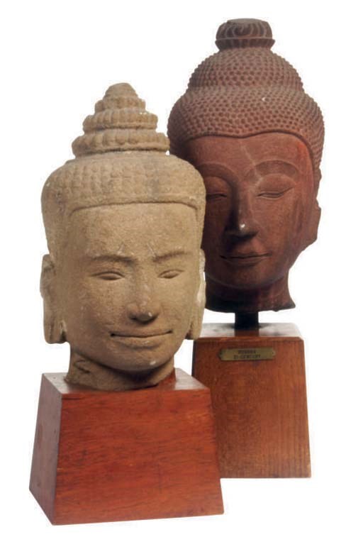A KHMER STYLE AND A AYUTHIA STYLE CARVED STONE HEAD OF BUDDHA,