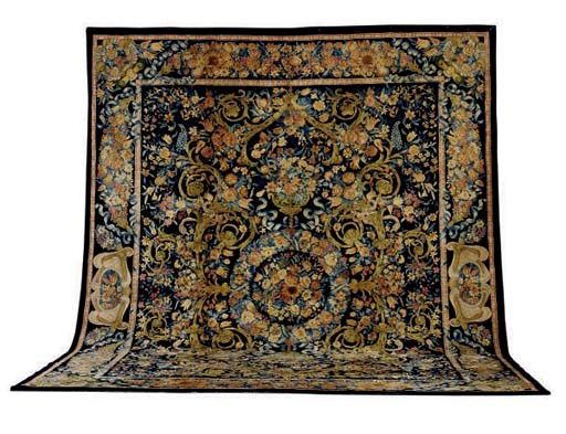 A LOUIS XIII SAVONNERIE STYLE CARPET,