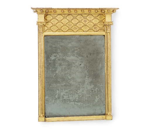 A REGENCY GILTWOOD MIRROR WITH LATTICE PANEL,