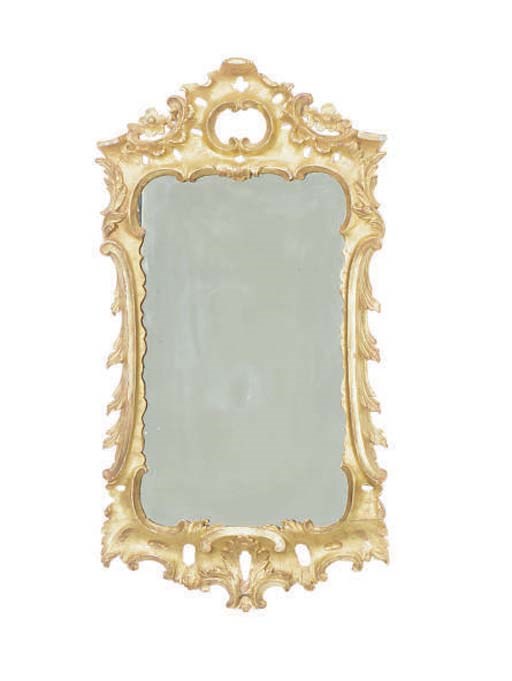 A GEORGE II GILTWOOD MIRROR WITH FOLIATE FRAME,