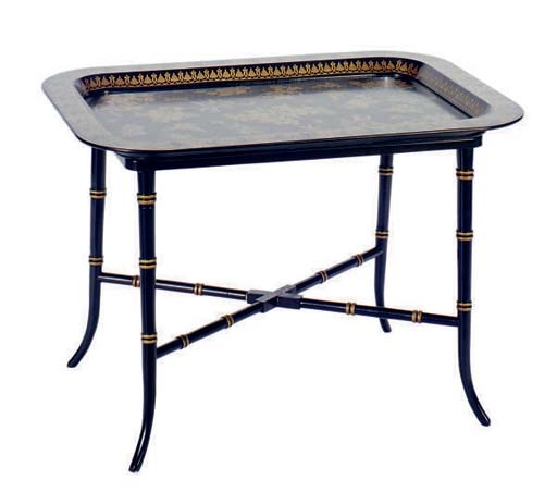 AN EBONISED AND PARCEL-GILT TRAY ON STAND,