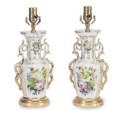 AN ASSEMBLED GROUP OF CERAMIC VASES MOUNTED AS LAMPS,