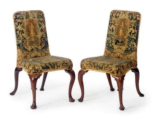 A PAIR OF GEORGE I TAPESTRY UPHOLSTERED WALNUT SIDE CHAIRS,