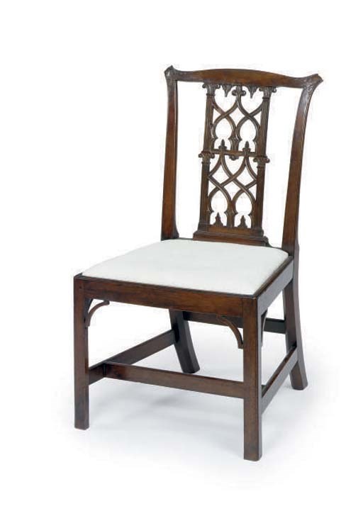 A SET OF SIX GEORGE III CARVED MAHOGANY DINING CHAIRS,