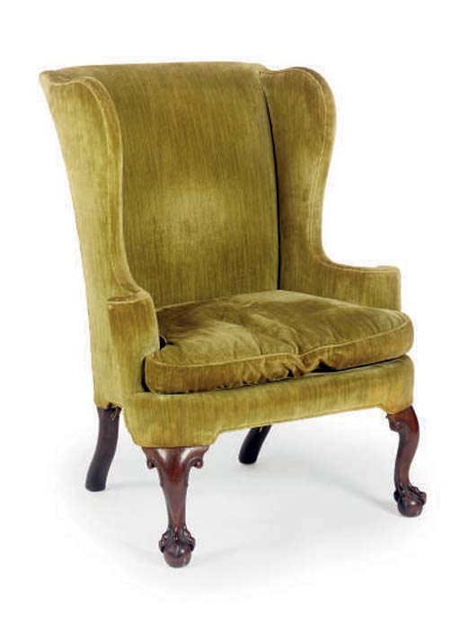 A GEORGE II WALNUT WINGBACK ARMCHAIR,