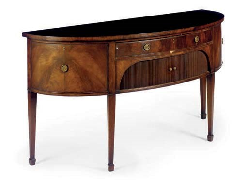 A LATE VICTORIAN MAHOGANY DEMILUNE SIDEBOARD**,