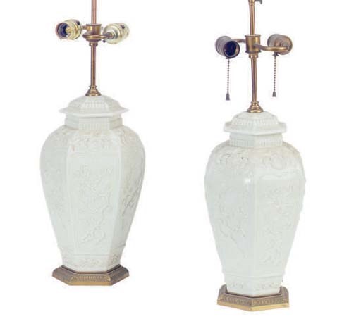 A PAIR OF BLANC DE CHINE VASES MOUNTED AS LAMPS,