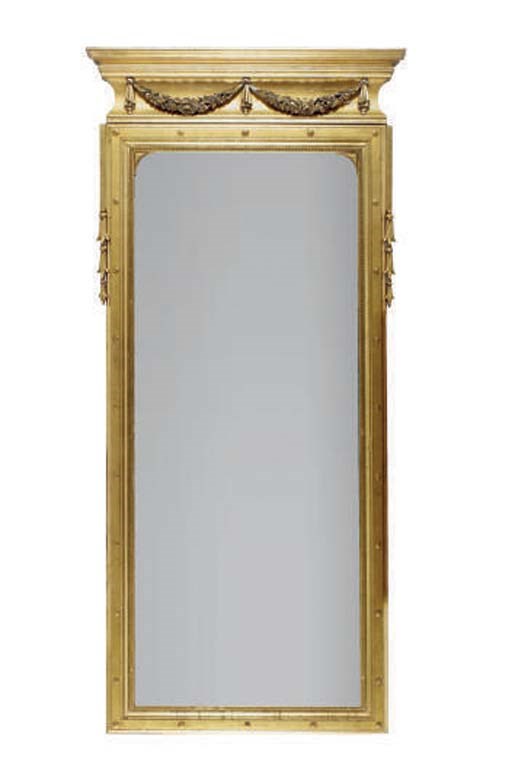 A CONTINENTAL GILTWOOD MIRROR,