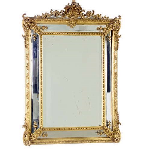 A FRENCH GILTWOOD AND COMPOSITION OVERMANTEL MIRROR,