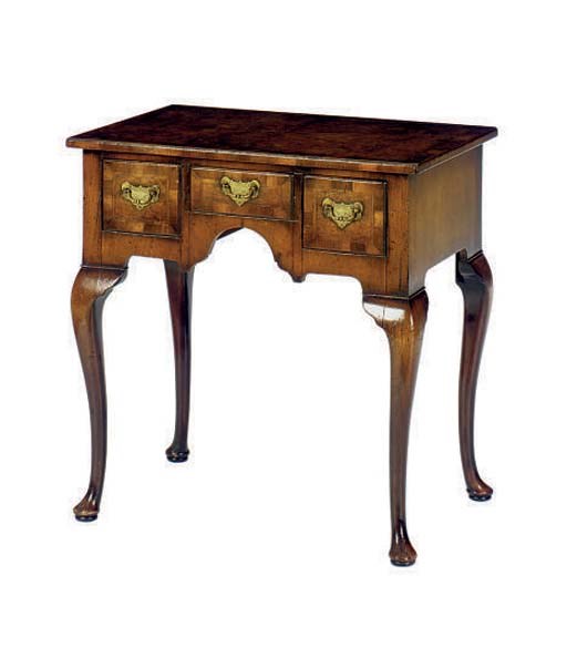 AN ENGLISH BURR WALNUT DRESSING TABLE,