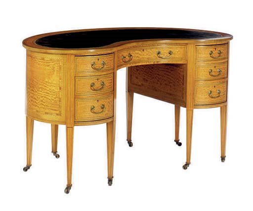 AN EDWARDIAN HAREWOOD INLAID SATINWOOD KIDNEY-SHAPED WRITING DESK,