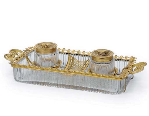 A FRENCH GILT-METAL AND CUT GLASS INK STAND,