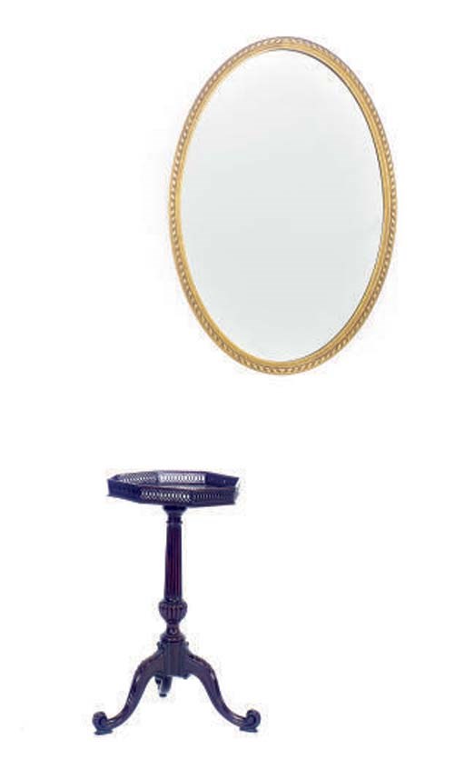 AN ENGLISH MAHOGANY OCTAGONAL TRIPOD TABLE TOGETHER WITH AN OVAL GILTWOOD MIRROR,