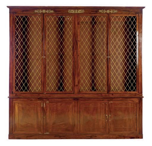 A MAHOGANY BREAKFRONT BOOKCASE,