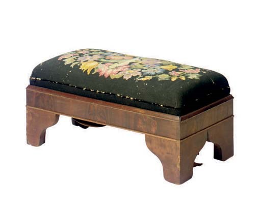 AN EMPIRE MAHOGANY NEEDLEPOINT UPHOLSTERED LONG STOOL,