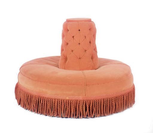 A CIRCULAR BUTTON-TUFTED UPHOLSTERED POUF,